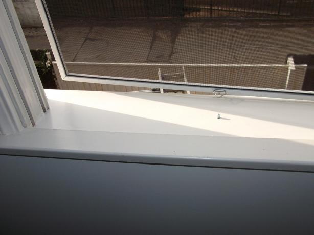 repaired window sill from termite damage